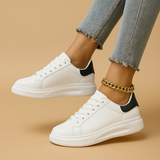 Biale skórzane sneakersy o minimalistycznym designie dla kobiet | Jinte