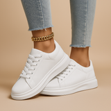 Biale skórzane sneakersy o minimalistycznym designie dla kobiet | Jinte